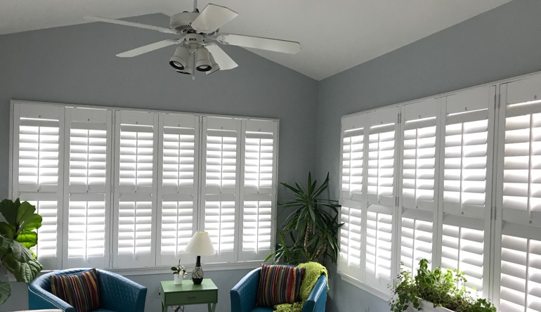 Virginia Beach sunroom with fan and shutters